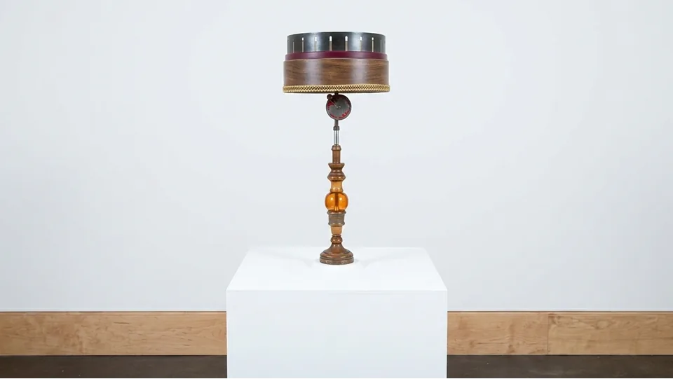 Time Warp — a hand-cranked zoetrope on a pedestal