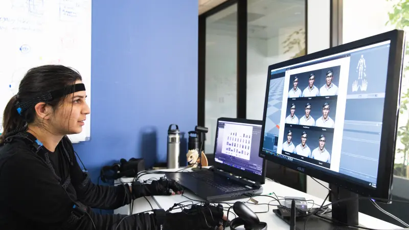 Motion capture artist building CG character for VR training