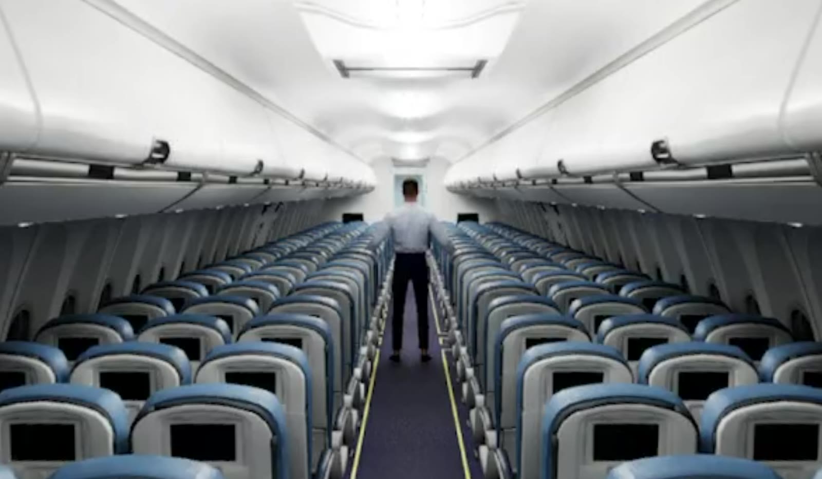 A crew member standing at the far end of the aisle with his arms held straight out, the default T-pose of an un-animated rig